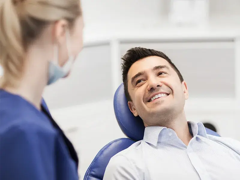 Image of a patient about to get a teeth cleaning.